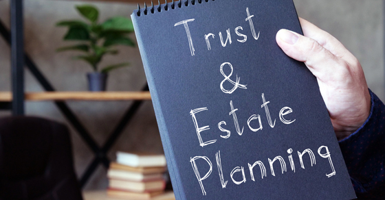 notebook with Trust and Estate planning written on the front cover