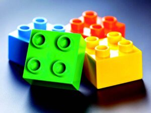 set of 4 different colored building blocks