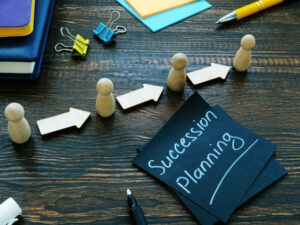 Succession planning sign and figurines with arrows. Representation of succession plan