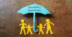 paper cutout family under paper cutout umbrella that has words disability insurance on it