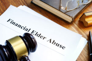 Financial Elder Abuse report and gavel in a court.
