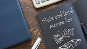 State and local income tax is shown on the business photo using the text
