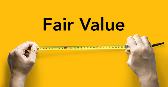 Person holding second hand pulling tape measure, hand tool for measuring length, Isolated on yellow background and clipping path.