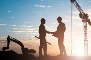 silhouette of Architects Shaking Hands Outdoors